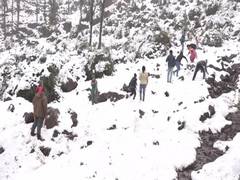 
      
      J-K: Tourists throng Panchari to enjoy fresh snowfall
      
      