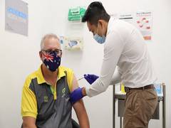 
      
      Australian PM Scott Morrison receives his first dose of...
      
      