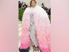 
      
      Serena Williams dons pink feather cape at Met Gala 2021
      
      