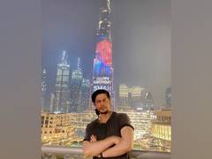 
      
      On 55th birthday SRK poses at illuminated Burj Khalifa 
      
      