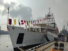
      
      Naval and Coast Guard ships dressed with signalling flags in Kochi
      
      