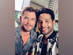 
      
      Siddhant Chaturvedi, Chris Hemsworth pose for a bright selfie
      
      