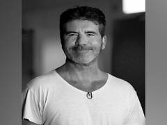 
      
      Simon Cowell 'healing at home' with broken arm following bike...
      
      