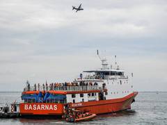 
      
      Indonesia's crashed plane likely ruptured when hitting...
      
      