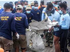 
      
      Indonesian authorities download crashed plane's black box
      
      