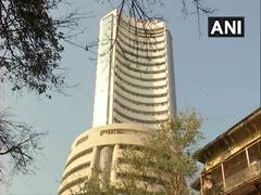 
      
      Sensex slides 366 points in volatile trading; cement stocks plunge
      
      