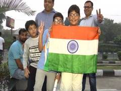 
      
      Ardent cricket fans defy air pollution to watch...
      
      