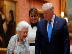 
      
      Melania saves the day as Trump fails to recognise his own...
      
      