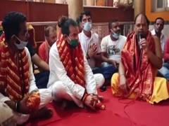 
      
      Tej Pratap offers prayers at Patna temple on father Lalu...
      
      