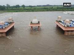 
      
      Swaminarayan temple submerged after heavy rain in Rajkot 
      
      