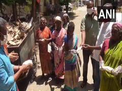 
      
      COVID-19: Textile store owner in Madurai distributes 8,000...
      
      