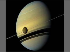 
      
      Saturn's moon Titan drifting away faster than previously thought
      
      