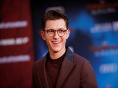 
      
      Tom Holland says he would 'of course' host Oscars
      
      