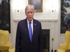 
      
      Trump removes mask after returning to White House
      
      