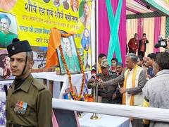 
      
      Uttrakhand CM attends Shaurya Mahotsav, pays homage to Darwan...
      
      