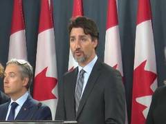 
      
      Trudeau kneels along with protestors demanding justice for...
      
      