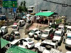 
      
      Chamoli-Badrinath highway jammed due to heavy influx of tourists 
      
      