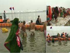 
      
      Devotees take holy dip, offer prayers at Sangam River in...
      
      