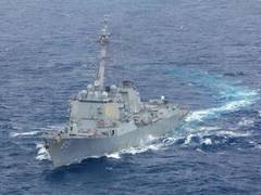 
      
      US warships sail near disputed Spratly Islands in South China Sea
      
      