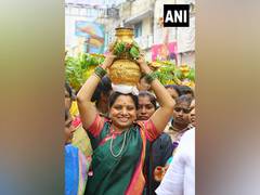 
      
      Telangana: MLC Kavitha offers 'Bonam' on Bonalu festival
      
      