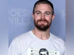 
      
      Stephen Amell welcomes second child with wife Cassandra Jean
      
      