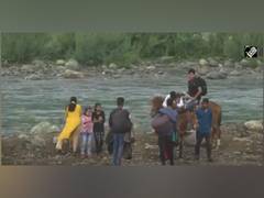 
      
      Tourist inflow picks up in J-K's Pahalgam with relaxation in...
      
      