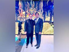 
      
      Pankaj Tripathi receiving the award at IIFA 2022
      
      