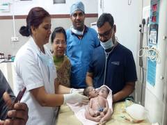 
      
      Woman gives birth in MP to boy with 2 heads, 3 hands
      
      