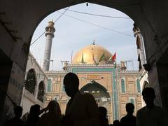 
      
      Clashes in Pak's Sindh over closure of shrine leave scores...
      
      