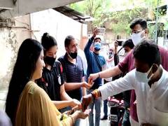 
      
      BJP leaders distribute yellow rice to encourage people to...
      
      
