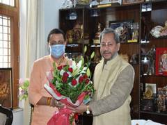 
      
      Uttarakhand's CM-designate calls on his predecessors ahead of...
      
      
