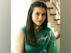 
      
      Kajol looks mesmerising in green organza saree on Maha Navami
      
      