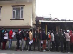 
      
      Serpentine lines outside District Election Office signal...
      
      