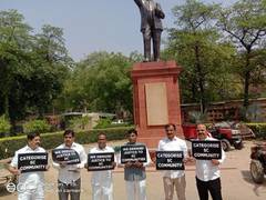 
      
      TRS MPs protest, demand 