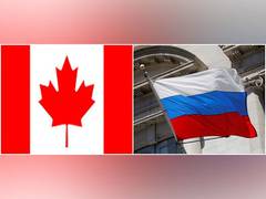 
      
      Canada sanctions 14 Russians
      
      
