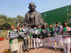 
      
      Winter session: TRS MPs hold protest, demand uniform...
      
      