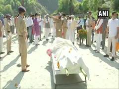 
      
      In Adityanath's absence, last rites of his father performed...
      
      