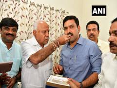 
      
      K'taka by-polls: BS Yediyurappa celebrates with son as trends...
      
      