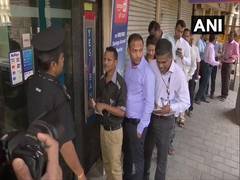 
      
      Yes Bank customers shocked over RBI decision, queue up at...
      
      