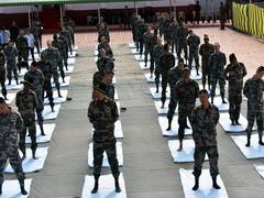 
      
      Chinese Army personnel participate in joint Yoga session with...
      
      