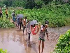 
      
      Villagers of Karbi Anglong forced to carry patients on shoulders 
      
      