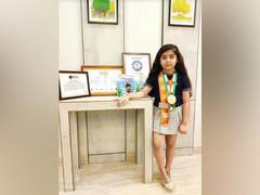 
      
      7-year-old prodigy becomes the world's youngest author and...
      
      