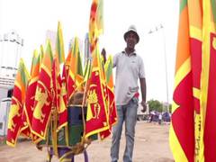 
      
      Sri Lanka: Failing economy forces auto drivers to sell flags 
      
      