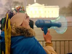 
      
      Demonstrators protest outside White House after Russia enters...
      
      