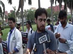 
      
      AIIMS resident docs take out candle march demanding security
      
      