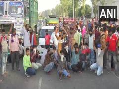 
      
      COVID-19 fallout: Migrant workers stage protest at Amritsar...
      
      
