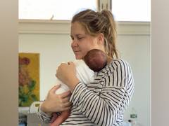 
      
      Amy Schumer posts picture of hubby Chrish Fischer giving son...
      
      