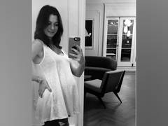 
      
      Not for a movie, writes Anne Hathaway as she shows off baby bump
      
      