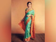 
      
      Madhuri Dixit charms fans with stunning pictures in...
      
      