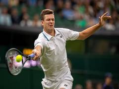 
      
      Wimbledon: Hurkacz stuns Medvedev to set clash with Federer...
      
      